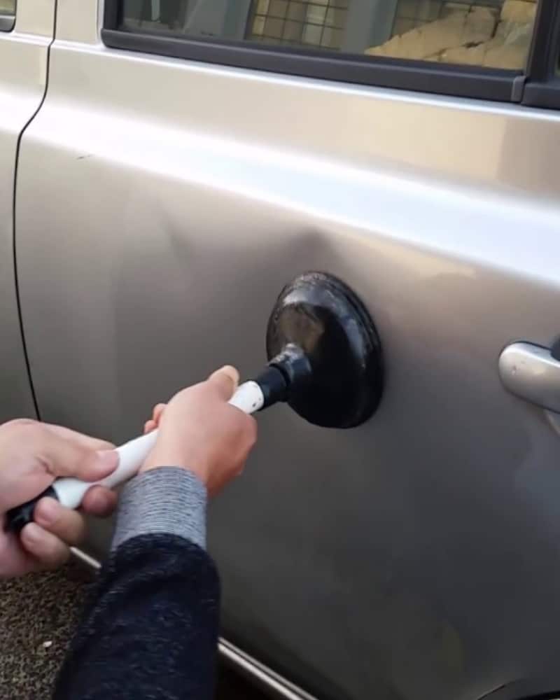 Strange But True Car Hacks You Never Knew Fix dents using a plunger