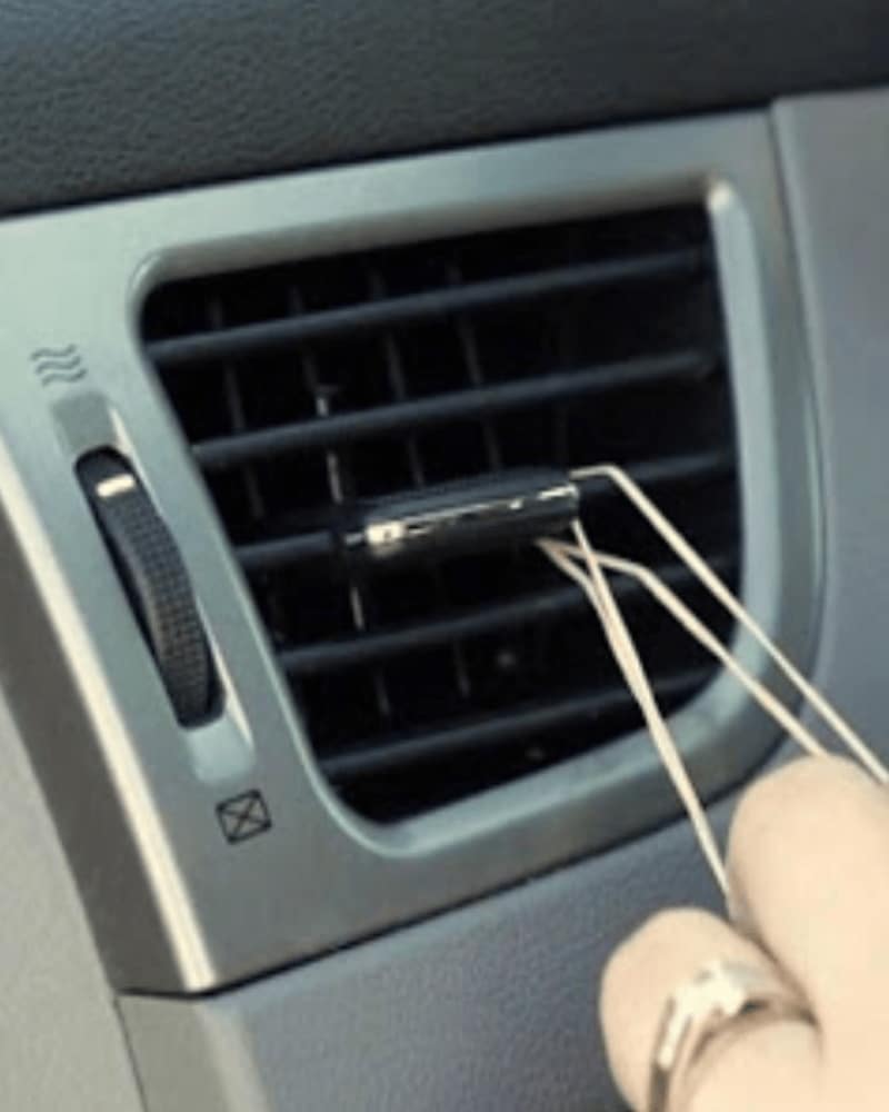 Strange But True Car Hacks You Never Knew Improvised cellphone holder