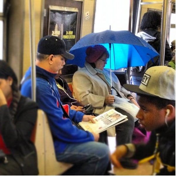 Suspect Moments Caught On The NYC Subway  Under my umbrella